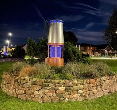 Photo of Mining Lantern taken at night showing the blue glow from the solar lighting