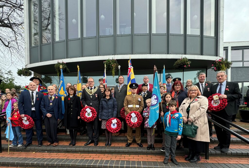 Representatives from Biddulph Town Council, The Methodist Church, Staffordshire County Council, The Royal British Legion, and 2151 Squadron on the Town Hall steps