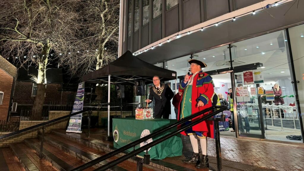 Biddulph's Mayor, Councillor Nigel Yates, and the Town Crier, Mr John Robinson, switching on the Christmas Lights on the Town Hall steps