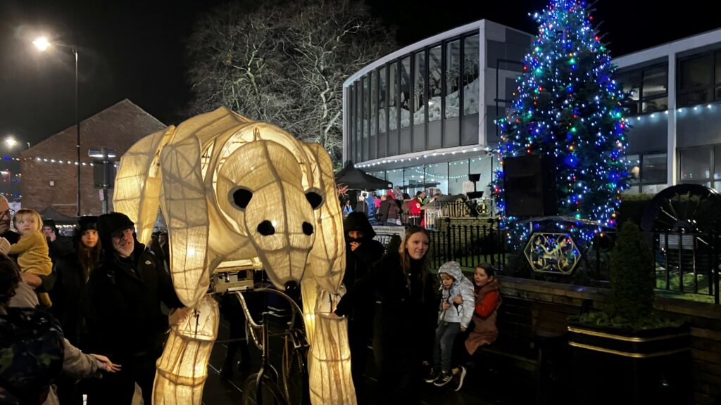 Polar bear outside the Town Hall in front of the Christmas Tree