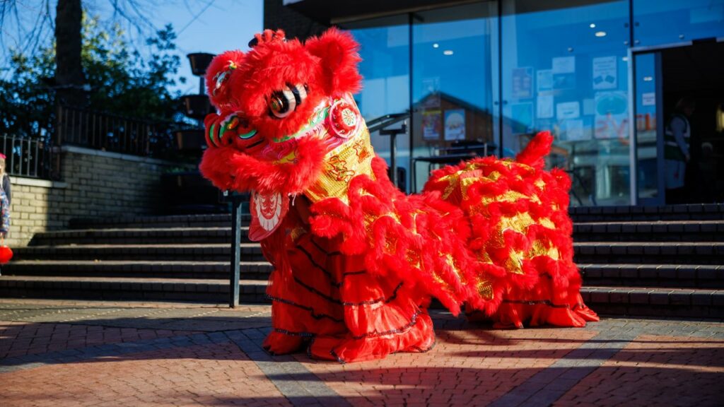 A photo of the Chinese Lion on the steps of the Town Hall