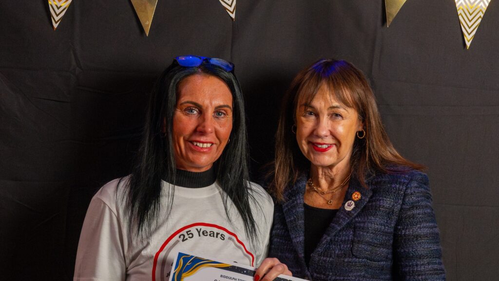 Mrs Judy Scott-Moncrieff presenting the Outstanding Contribution award to Nicola Everill