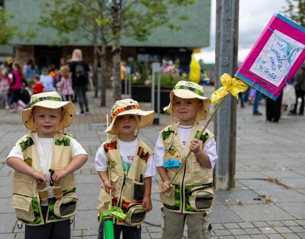 3 small members of Biddulph Yarnbarms group dressed as little explorers